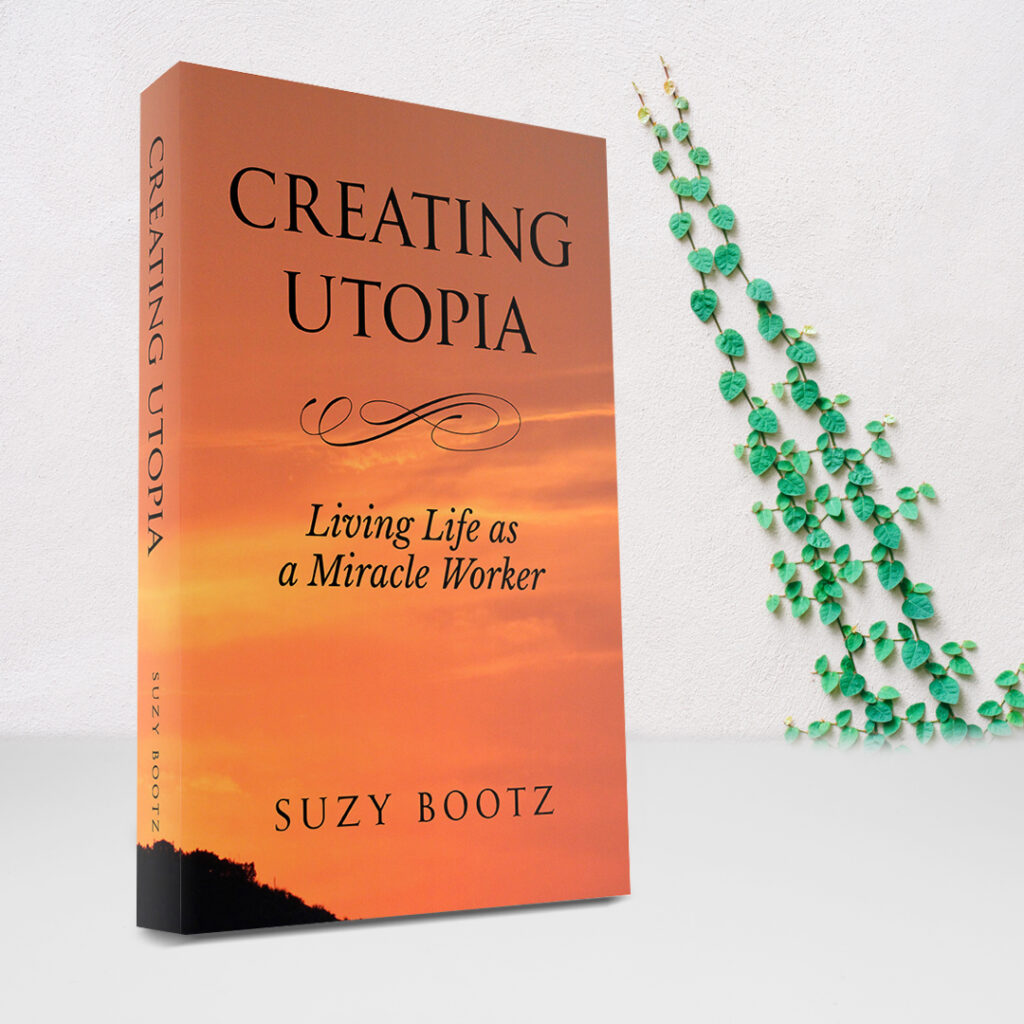 A book about creating utopia sitting on top of a table.
