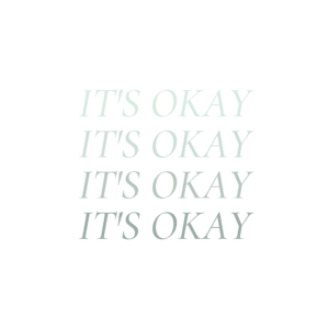 A white sticker with the words " it's okay " written in green.